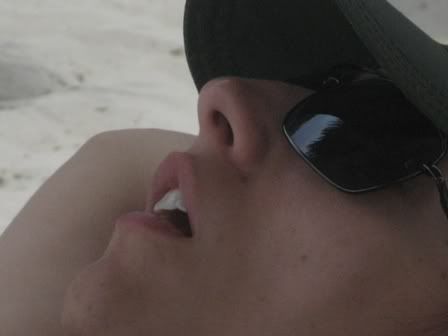Me recovering on the beach from food poisoning, not the most flattering picture...