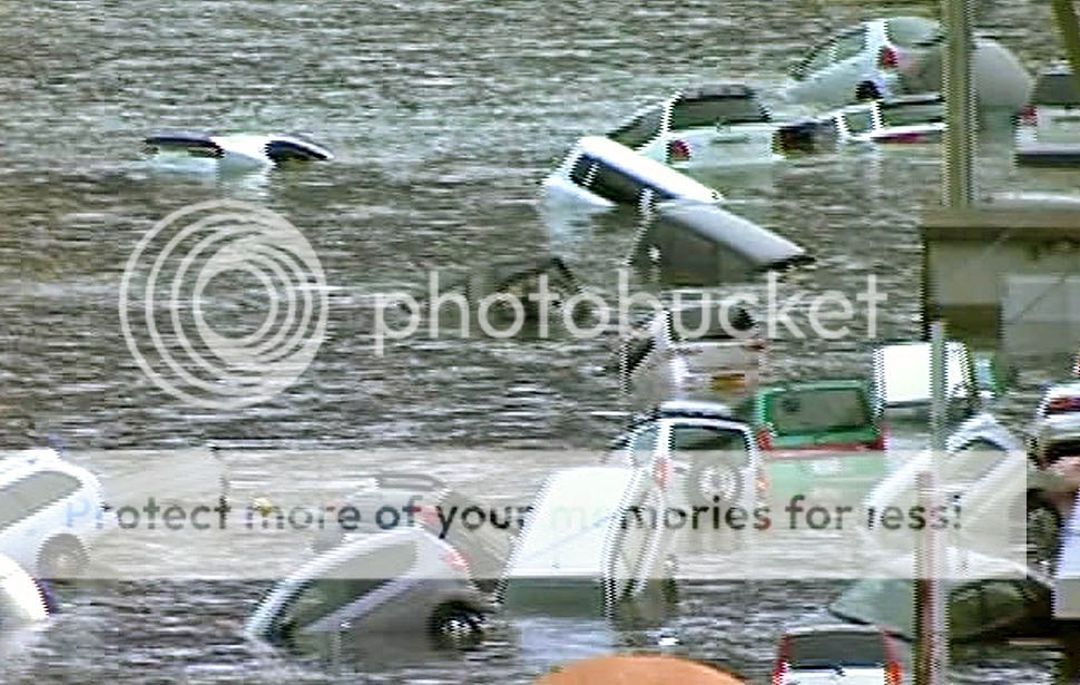 Eastern Japan &#8212; Vehicles are washed away by a tsunami in the coastal area of eastern Japan.